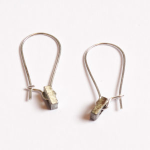 Factory Floor Jewels Steel Nuts Earwires on white