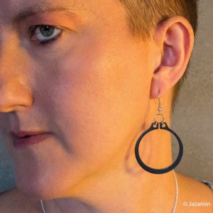 Black and silver statement circlip earrings by factory Floor Jewels