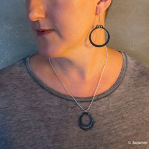 Black and silver statement circlip earrings by factory Floor Jewels