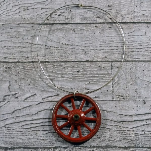 Statement Red Necklace - Red Wheel (ltd edition) by factory floor jewels concrete grey background