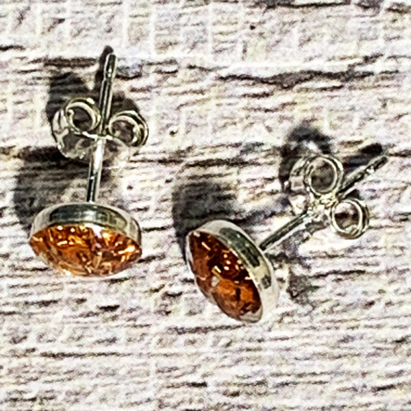 silver and bronze stud earrings
