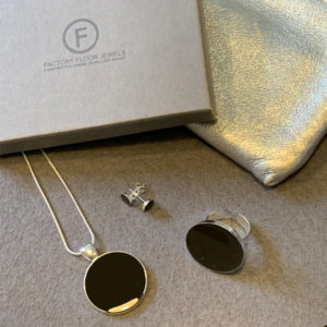 Factory Floor Jewels Black concrete jewellery lifestyle photo
