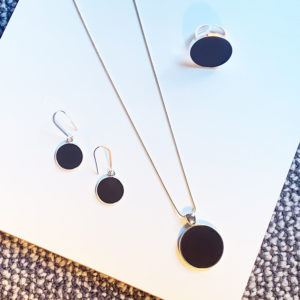 silver and black concrete ring, pendant and earrings