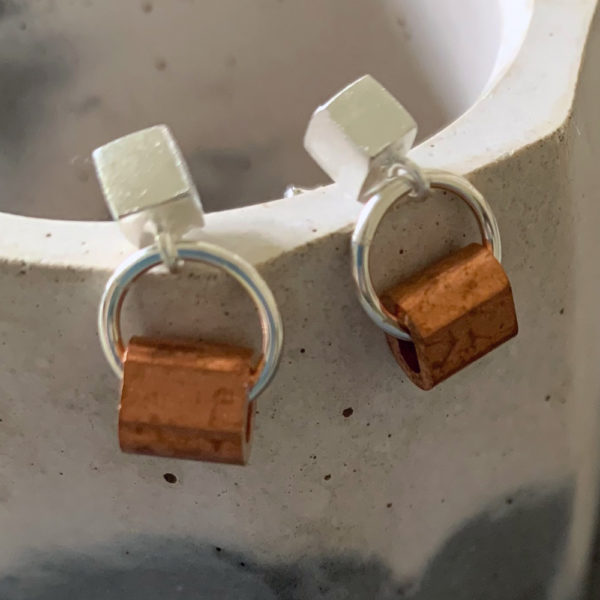 silver and copper earrings
