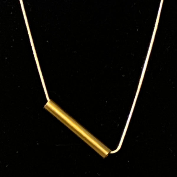 brass pendant on an angle