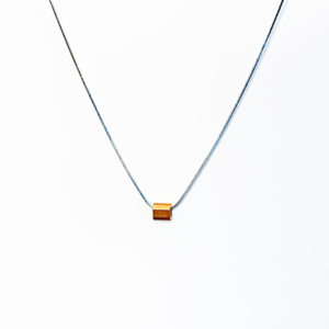 tiny copper tube on steel chain by Factory Floor Jewels