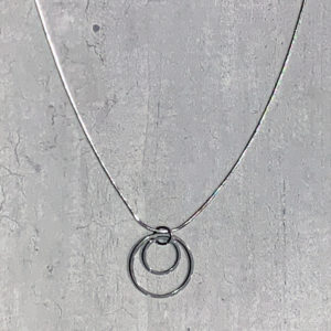 steel pendant with circles