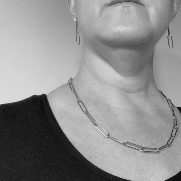 steel paperclip chain - 20 inches long, worn by a woman in a black and white photo
