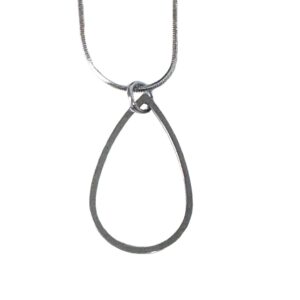 Close up of a steel teardrop pendant